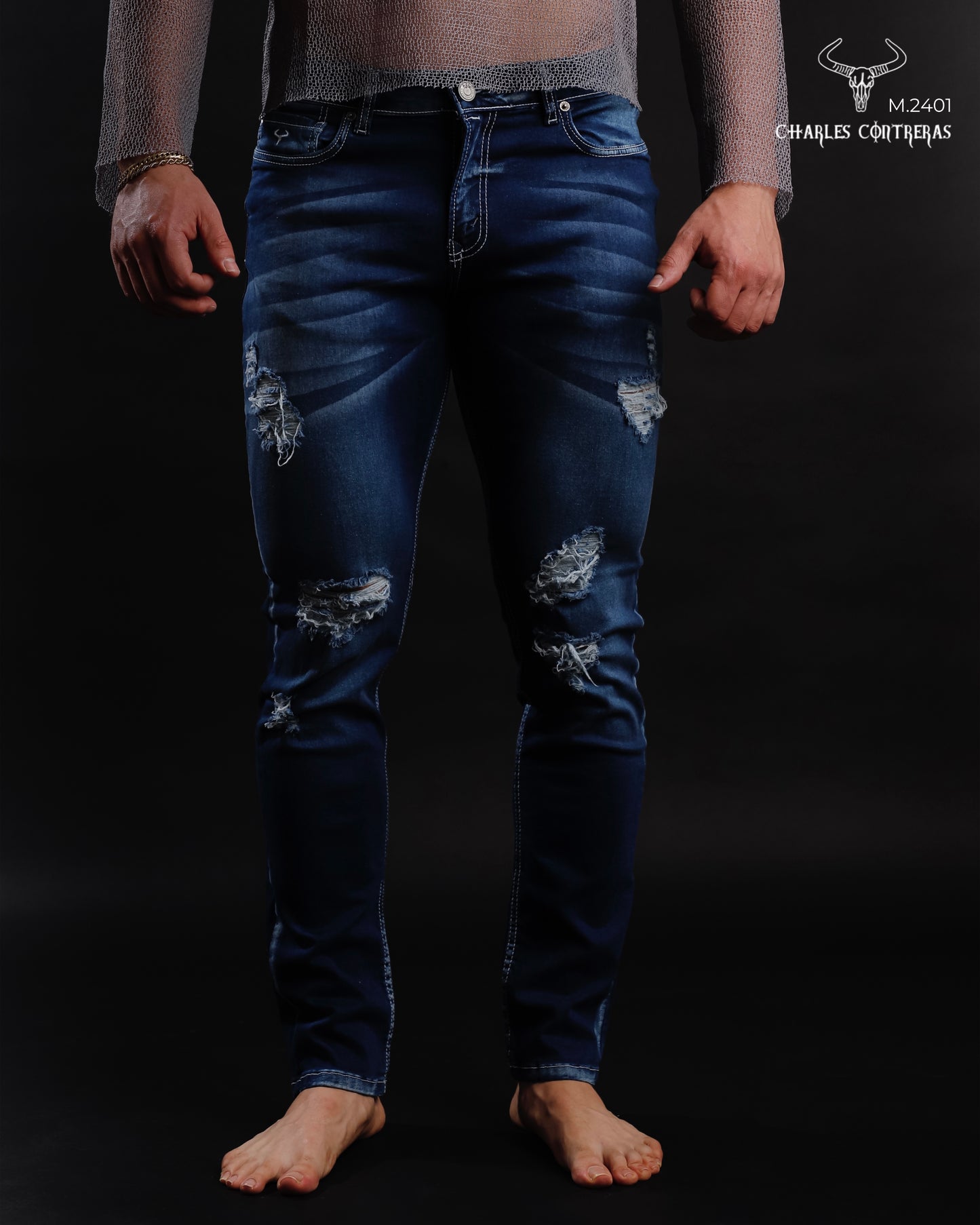 Jeans corte Slim, para caballero con roturas.